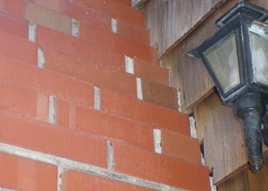 a repaired chimney in Wellington that had shown serious foundation damage and was repaired with a helical pier system.
